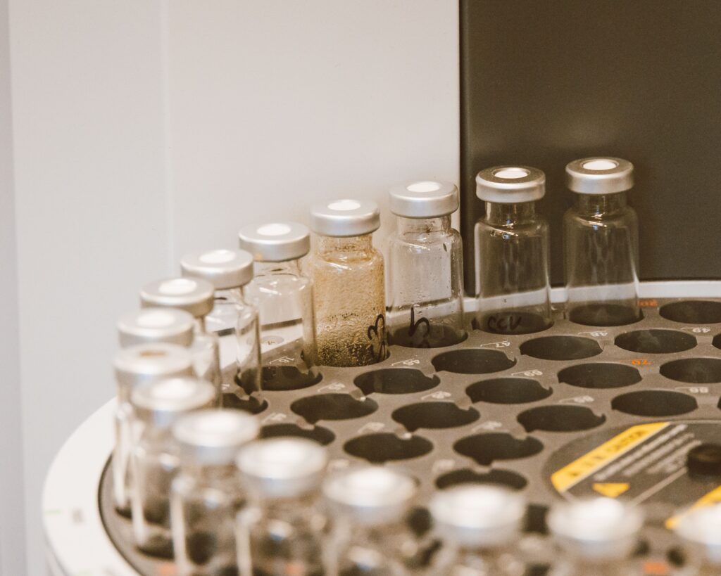 Vials arranged in a lab rack, showcasing scientific organization and research preparation.